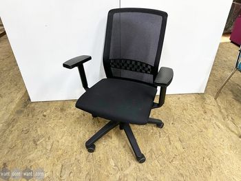 Used black mesh back operator chair