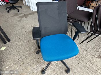 Used Okamura operator chair with blue seat 