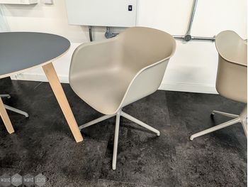 Used Muuto swivel chair on pyramid base