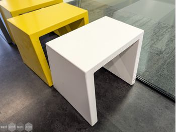Used metal stools in various colours