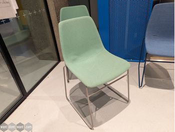 Used Mint green upholstered chair with grey sled frame