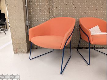 Used Boss Design Orange chair with blue wire frame