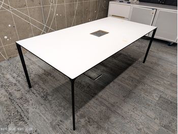 Used 2000mm meeting table with white top and central cut-out