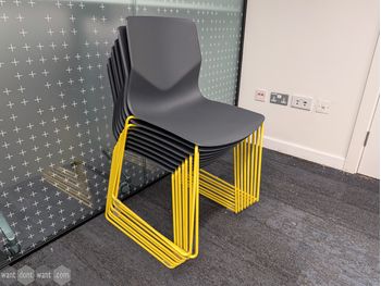Used Ocee & Four Design chair in black on yellow base