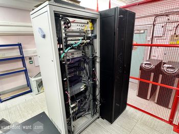Used server cabinet in black metal
