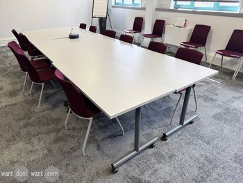 Used 1400mm flip-top tables in white on wheels