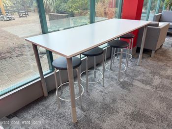 Used 2000mm white high table with grey pole legs 