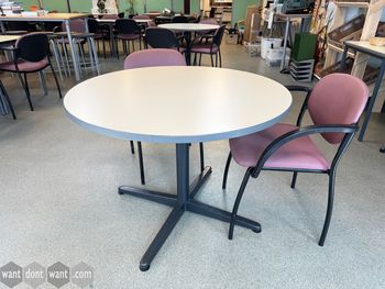 Used 1000mm cream circular table with black star base
