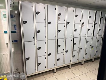 Used multi-door lockers in grey metal