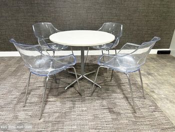 Used transparent clear plastic 'Opal' chairs with chrome legs.