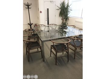 Magnificent used 1730mm 'Monica Armani' glass top table with steel cross frame
