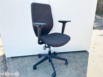 Used Orangebox 'Joy' chairs upholstered in brown fabric.