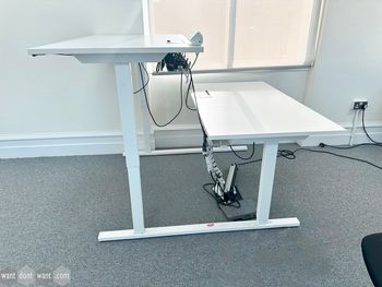 2 x 2-person used electric height-adjustable desks (6 x desk positions)