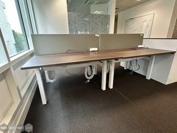 Used immaculate 'Task' electric Sit/Stand back-to-back workstations 