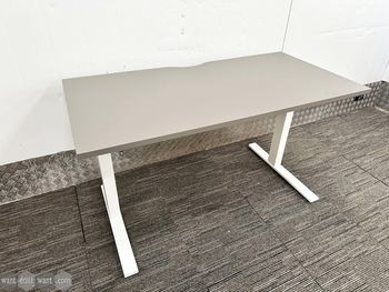 Used 1400mm sit stand desk with grey top and white frame