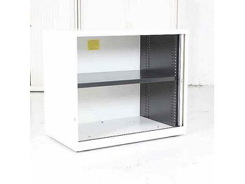 Further view of the white tambour cupboards shown in the previous image.