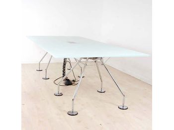 Further view of these stunning Tecno Nomos tables by Sir Norman Foster.