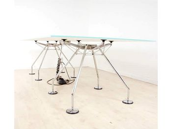 Further view of these stunning Tecno Nomos tables by Sir Norman Foster.