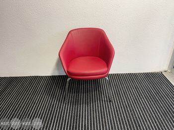 Used Frovi lounge chairs in red
