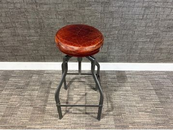 Used height adjustable leather stool