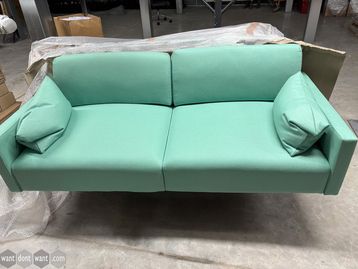 Used 2-seater Connection Leo sofa with black frame