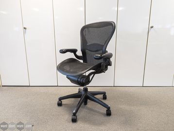 Used Herman Miller Aeron chair with no forward tilt