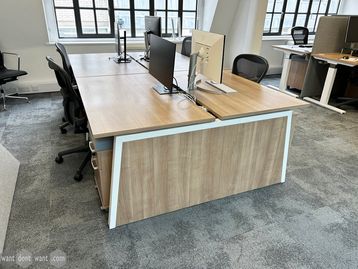 Used 1400mm bench desks with sliding tops 