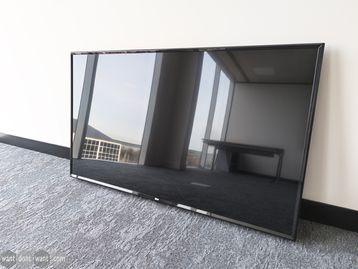 Used 55 LG wall mounted display 