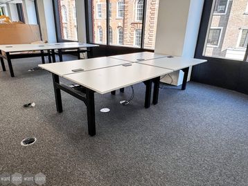 Used 1400mm back-to-back bench desks with power