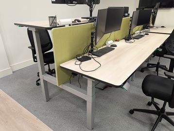 Used Assmann 1500mm back to back sit stand desks