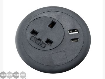 New in-desk power grommet 