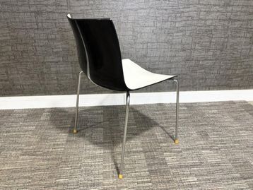 Used Arper Catifa stacking chairs with black back
