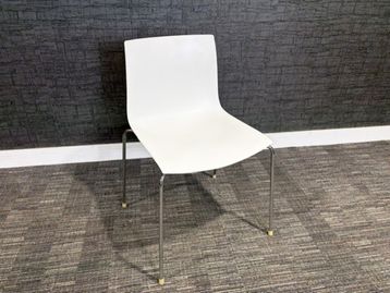 Used Arper Catifa white stacking chairs 