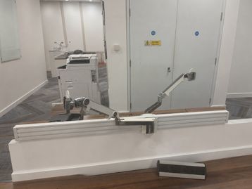 Used Humanscale twin monitor arms