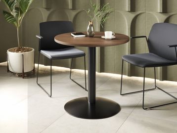 New circular table with trumpet base in choice of size and finish