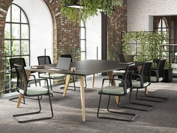New boardroom table with solid wooden legs in choice of size and finish