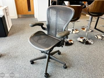 Used Aeron chairs (size B). Fabric arms - no lumber support but can be purchased.