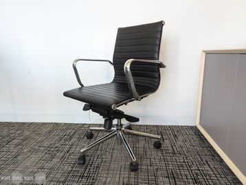 Used Eames style meeting chair on castors 