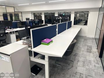 Used 1800 'Elite' back-to-back height adjustable bench desk