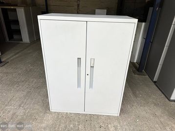 Used white double door cupboard with 2 shelves
