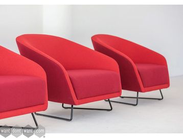 New curved armchairs with black metal frame