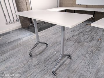 Used 1500mm Boss Design flip-top high table on castors