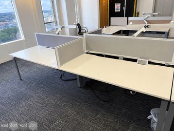 Used 1600mm bench desks with scalloped tops and power