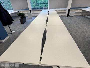 Used 1600mm bench desks with scalloped tops 