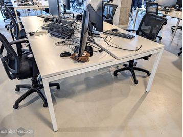 Used U-frame desks in various configurations