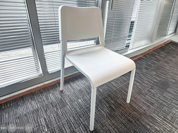 Used white plastic chair 