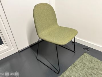Used Modus meeting chairs in green fabric