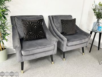 Used armchairs upholstered in grey fabric